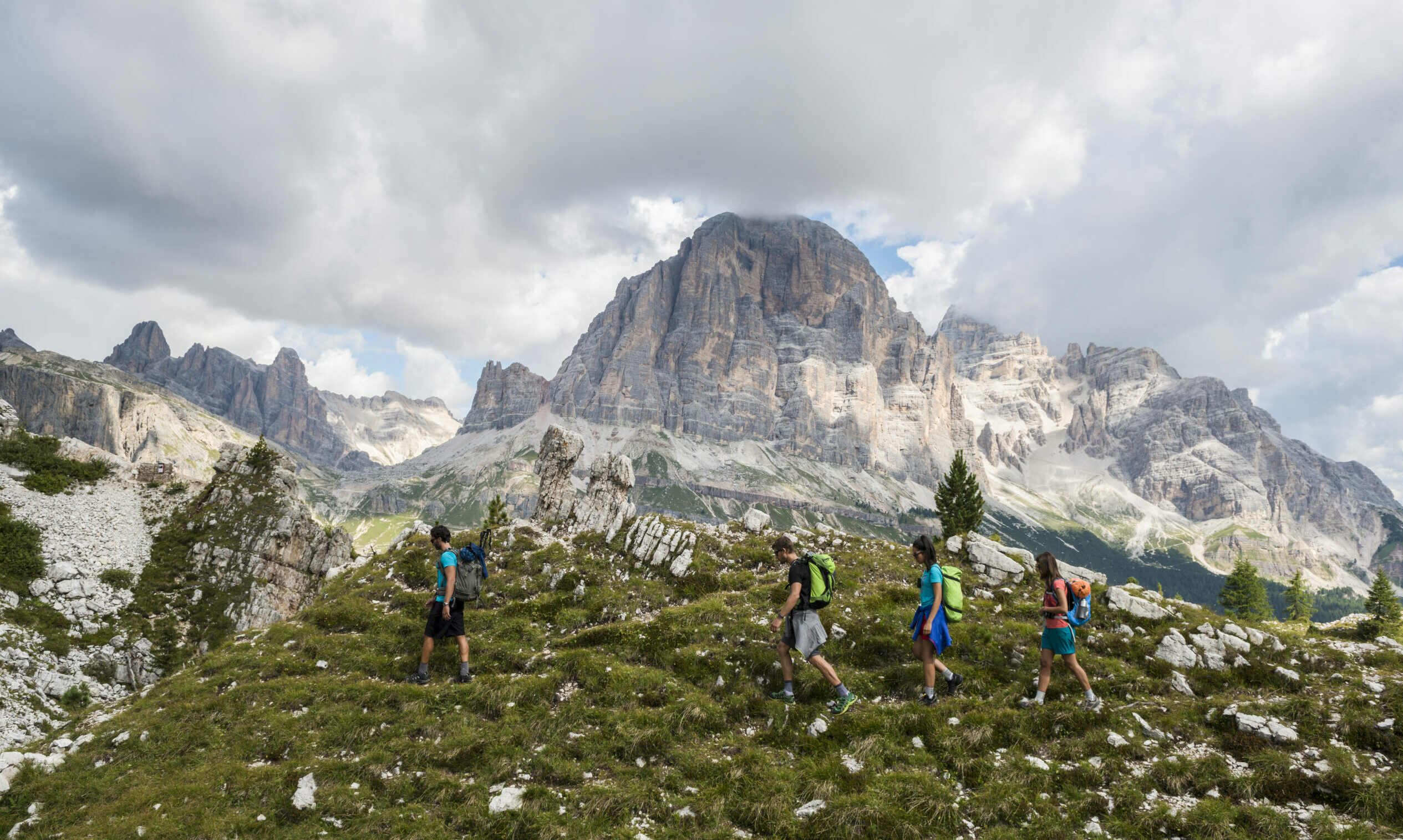 Italy, Friends trekking in the Dolomtes